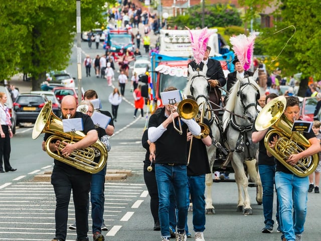 The procession winds its way through the streets