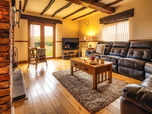 The relaxing living room could lend itself to entertaining, with the garden access.