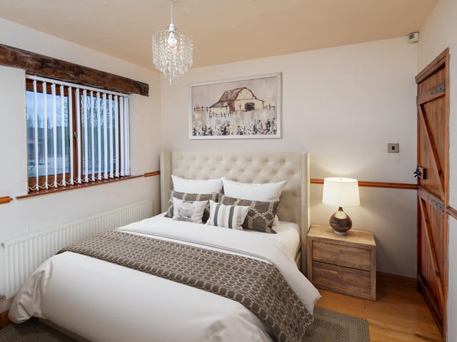 A smaller, but charming double bedroom within the property.