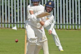 Jonny Booth hit 107 in Townville's win over Farsley that saw them climb the Bradford Premier League.