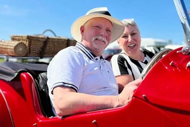 Karen and Terry in his sports car
