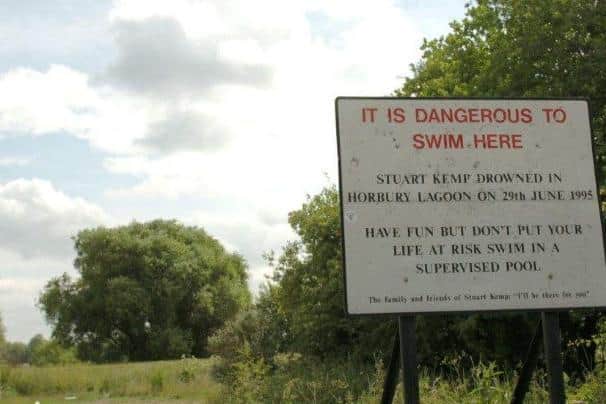 The warning sign erected by family and friends of Stuart Kemp who drowned in Horbury Lagoon.