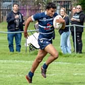 Prashant Veerasamy races clear on his way to an exciting try for Featherstone Lions at Myton Warriors. Picture: Jonathan Buck