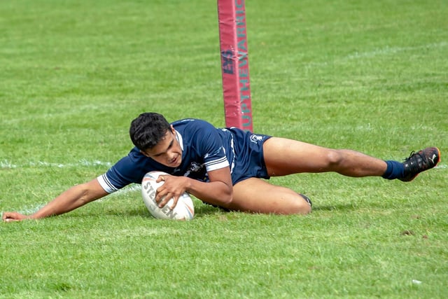 Teenage sensation Prashant Veerasamy grounds the ball to complete his long distance try. Picture: Jonathan Buck