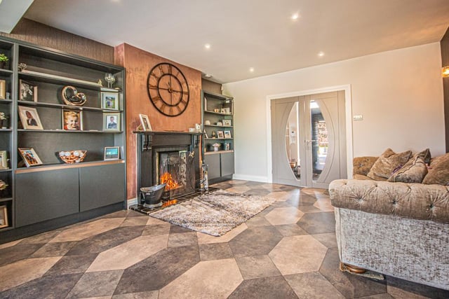 The fireplace is a focal point here, as in other ground floor reception rooms.