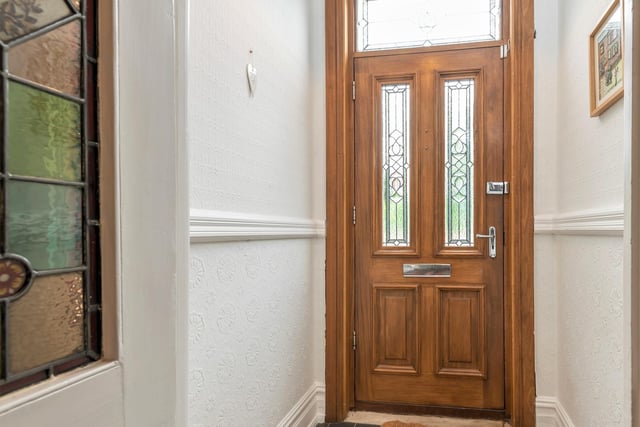 An entrance porch with tiled floor leads in to the hallway.