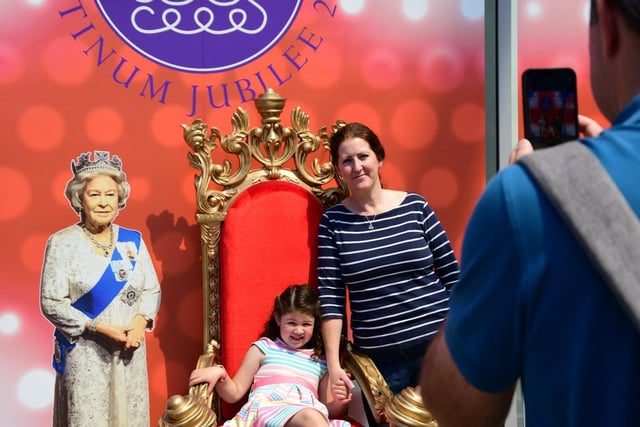 Families enjoyed a selfie photo opportunity next to the jubilee backdrop.