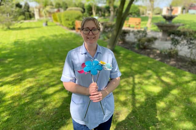 Buying a forget me not flower will help the hospice