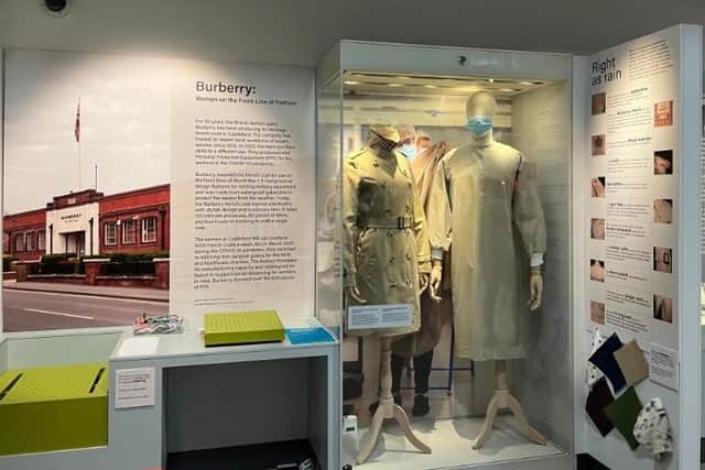 One of Castleford’s most famous exports, the iconic Burberry trench coat is on show, along with a PPE gown made for NHS and healthcare workers during the COVID-19 lockdowns, in the same signature honey beige as Burberry’s famous rainwear.