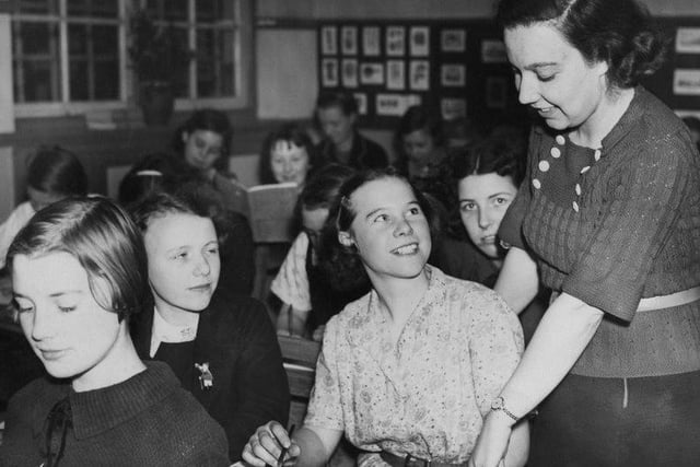 Teacher Alice Bacon (1909 - 1993) in a classroom at Normanton Senior School, after being nominated as the Labour candidate for Leeds North East in the upcoming election, 19th October 1938.