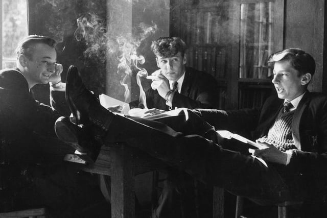 Senior schoolboys enjoying a cigarette in the smoking room at Highfields Grammar School, near Wakefield, Yorkshire where fifth and sixth formers are allowed official smoking sessions. The headmaster, Rev Edward Smithies, believes that officially sanctioning the habit will make it lose its attraction.
