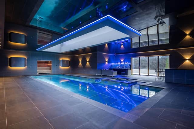 With the spa and pool facilities is a bespoke bar, changing rooms and showers, a dance studio or gym, and a sauna.