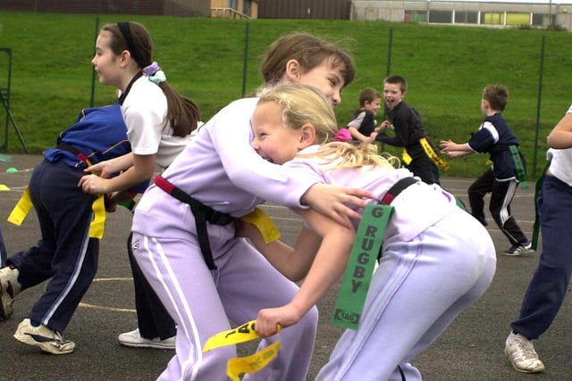 Youngster enjoy a game of tag rugby at the Outwood Grange 'Pay to Play' day.
