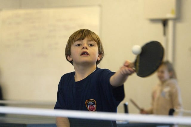 Michael Coopey playing table tennis.