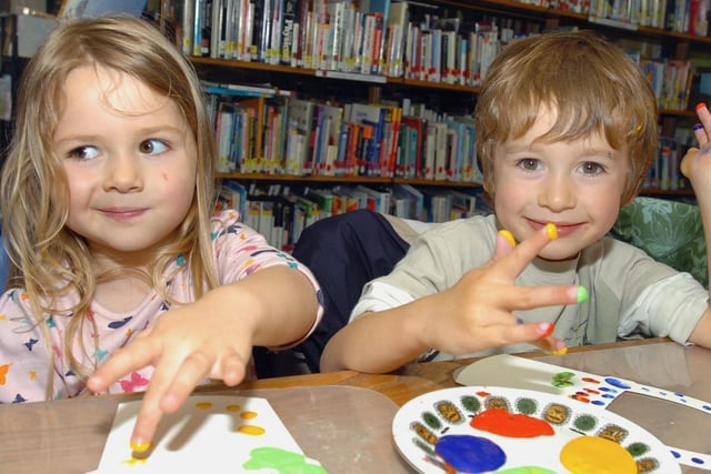 Horbury Library. Paint pot playtime. Eden and Oliver Haycock, aged four and five.