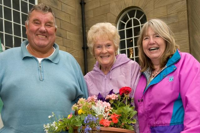 Alan Greenhalgh with Silvia Haigh & Carol Holdsworth who were running the church gardening stand.