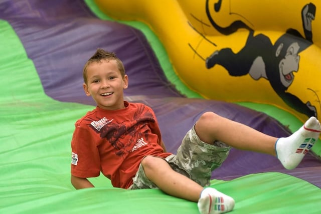 Aaron Lennon on the bouncy castle.