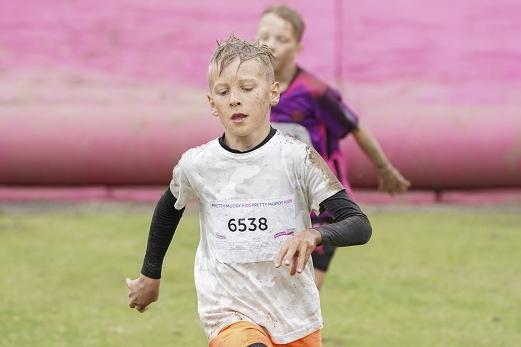 In Pretty Muddy, runners have to make their way through a muddy obstacle course, which includes climbing frames, slides, tunnels and mud pits, before crossing the finish line.