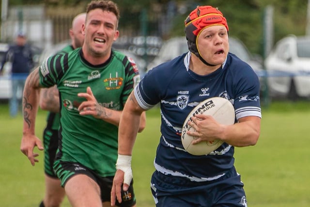 Harley Axe on the charge to take Featherstone Lions further ahead. Picture: Jonathan Buck