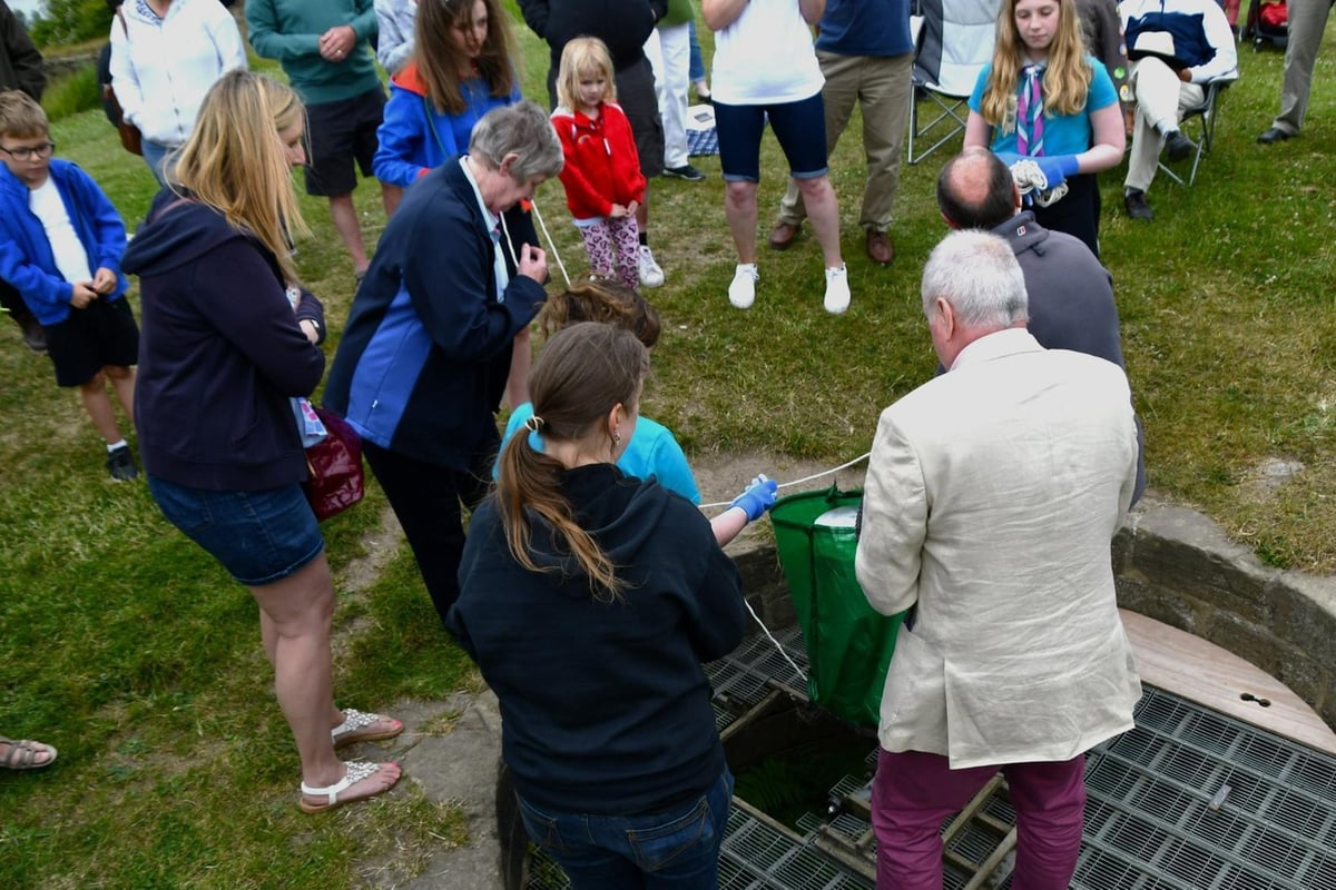 Time capsule is lowered into the well at Wakefield's Sandal Castle