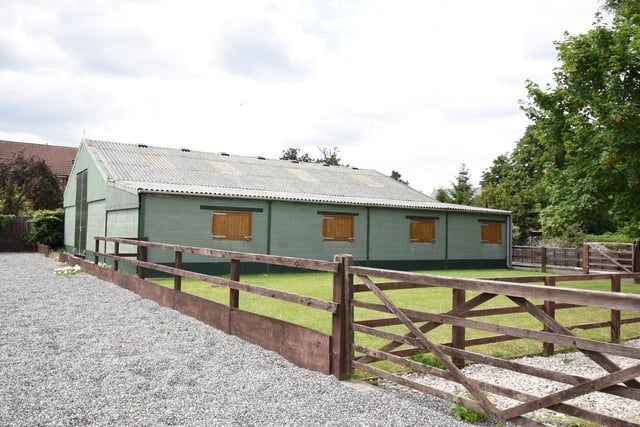 Four stables and a lockable tack room are within this former barn.