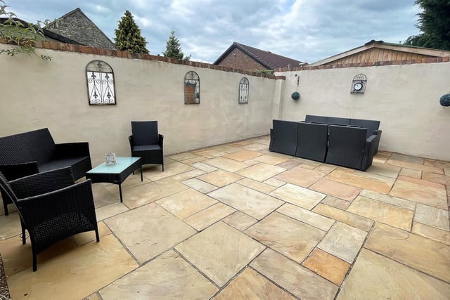 Plenty of room to entertain in this walled al fresco dining area.