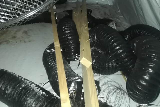 Fans and pipes in the loft that was kitted out for growing cannabis.
