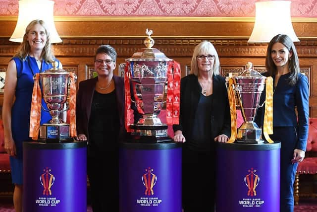 Former rugby league referee Julia Lee, former Lioness Kirsty Robinson, international coach Jackie Sheldon and former Lioness Rebecca Stevens with the World Cup trophies. (Photo: Simon Wilkinson)