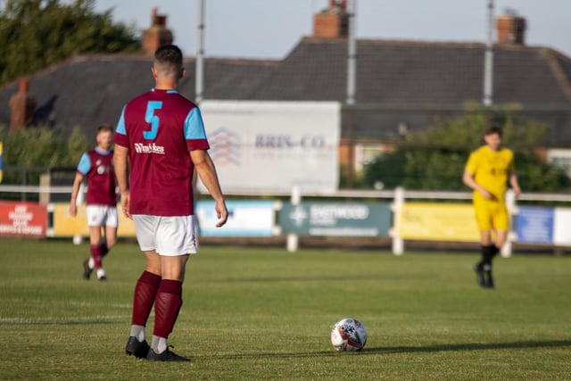 Emley look to play the ball forward after being given a free-kick. Picture: Mark Parsons