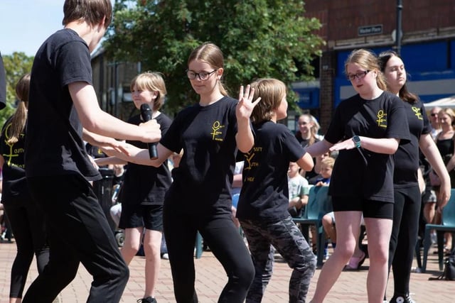 Ossett Youth Theatre Group dancing to entertain their fans.