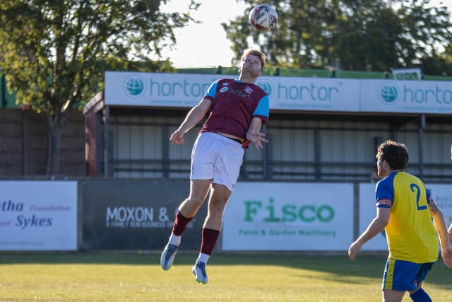 Joe Jagger gets up high to try to head the ball. Picture: Mark Parsons