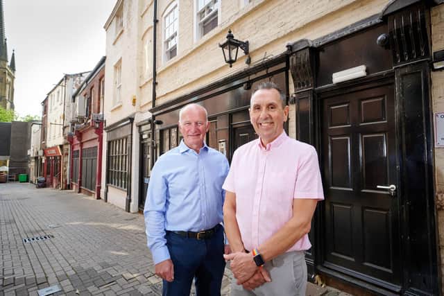 Cormac Hamilton, Chair of Wakefield High Street Task Force, and Councillor Darren Byford, Cabinet Member for Regeneration, on Bread Street in Wakefield city centre.