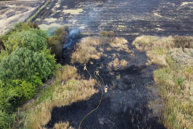 Firefighters tackled a large field fire in Sharlston yesterday (PHOTO AND VIDEO: @charleyatkinsphoto)