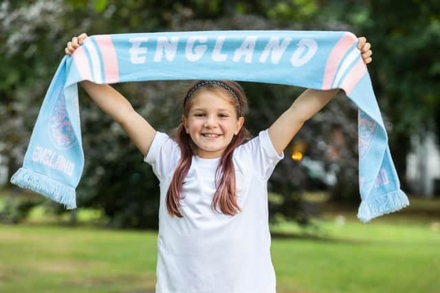 The footy-mad youngster hopes to be at Wembley on Sunday when Sarina Wiegman's side take on the winners of France vs Germany. (Credit: SWNS)
