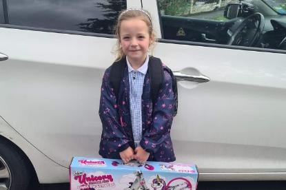 Margaret Stokes shared her photo of Eevee-May with her scooter from school for 100% attendance.