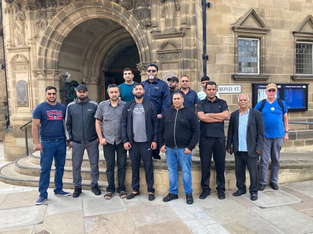 Members of Wakefield Drivers Association pictured outside County Hall, in Wakefield. The Council's chief executive has apologised to the drivers after they were blocked from entering a public meeting over changes to the taxi trade.