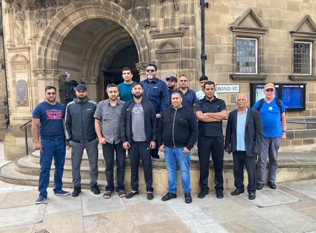 Members of Wakefield Drivers Association pictured outside County Hall, in Wakefield. The Council's chief executive has apologised to the drivers after they were blocked from entering a public meeting over changes to the taxi trade.