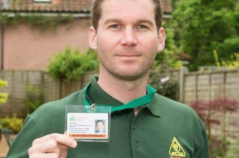 Look for the badge – an OFTEC technician with his ID