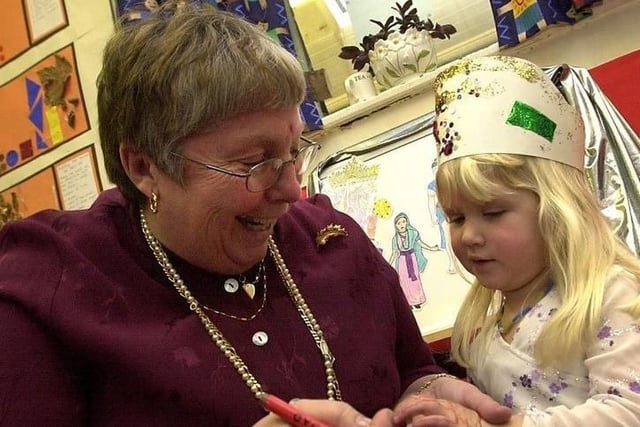 Diwali celebrations at Crigglestone Nursery in 2004 with teacher Mrs Linda Parks and Hannah Proctor during the Mendhi hand painting session.