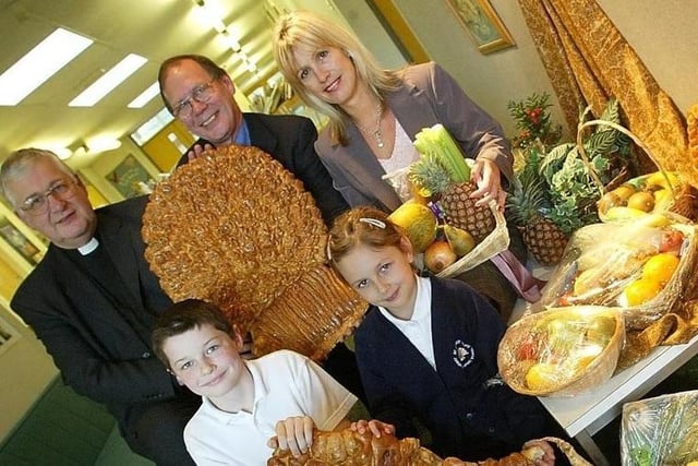 Harvest Festival 2004, St James School, Crigglestone pupils- Michael Sykes and Katie Jackson with Cannon John F White - Chair of Govenors, Roy Liberman - Bakery manager of Sainsburys Wakefield and Colleen Gibson - Head Teacher.