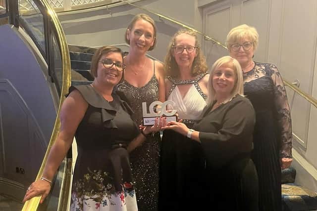 Councillor Margaret Isherwood, (back row third left) with staff from Wakefield Council's children and young people's services. The service won an LGC Award in July this year.