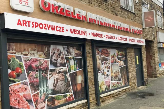 The owners of Orzelek International Foods have been given permission to sell alcohol to customers who spend at least £10 on other goods.