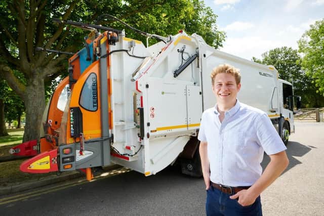 Councillor Jack Hemingway with an electric refuse vehicle which is currently being trialled by Wakefield Council.