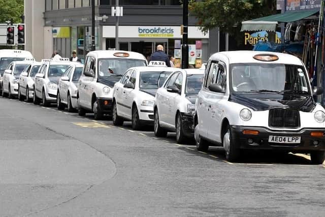 Wakefield’s taxi driver suitability policy is to be reviewed after councillors voted in favour of holding a consultation over its controversial licensing rules.