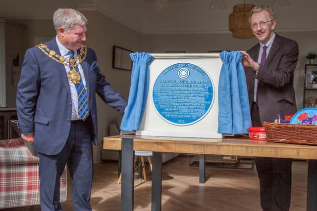 The Mayor of Wakefield, Councillor David Jones, left, and Kevin Trickett, President of Wakefield Civic Society, unveil blue plaque in honour of Wakefield's first female Mayor Fanny Stott. Picture by Shaun Walker