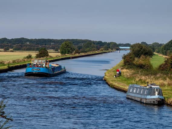 Two pensioners were left with injuries after a man punched them and struck them with his bike during a walk along a canal close to Birkwood Road, Normanton. Stock image of the Aire and Calder navigation.