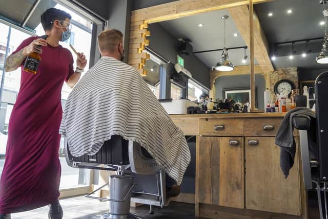 Lisa de Cernatony cuts hair at Kraft Barbers