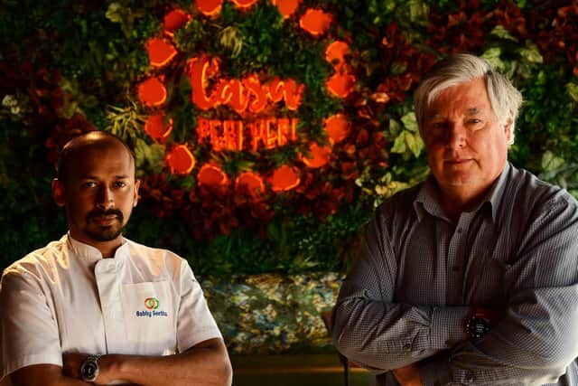 Among Casa Peri Peri's offerings will be flame grilled peri peri chicken, slow cooked peri peri beef short rib, a spicy rice protein bowl and sizzling hot chocolate fudge brownie. Pictured are Bobby Geetha and Rob Campbell at the restaurant in Trinity Walk.