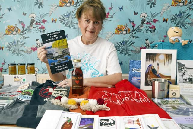 A Wakefield woman whose Facebook mix up saw her gifted a box of treats from Canada - and a group of new, international friends - is set to tell her story on the BBC's One Show. Sue Perry is seen with her box of gifts from Wakefield, QC.