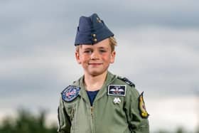 Seven-year-old RAF-obsessed Jacob Newson, whose mother passed away from breast cancer last year, has taken to the sky for his first 'flying lesson'.